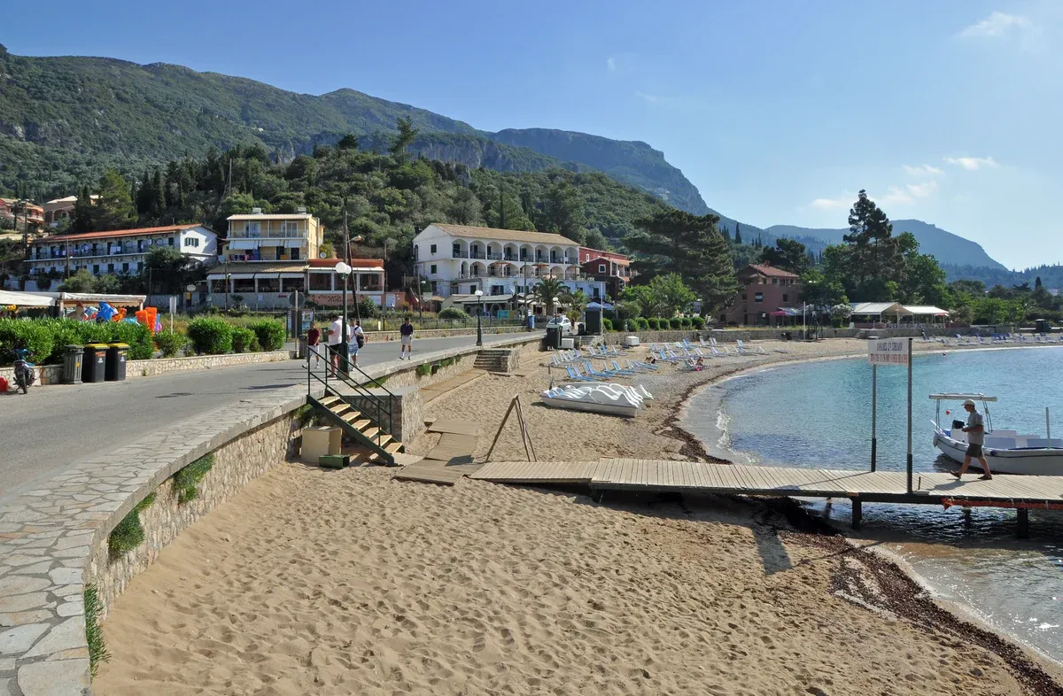 Paleokastritsa bay and jetty on the west coast, a base for Corfu boat rental to the caves